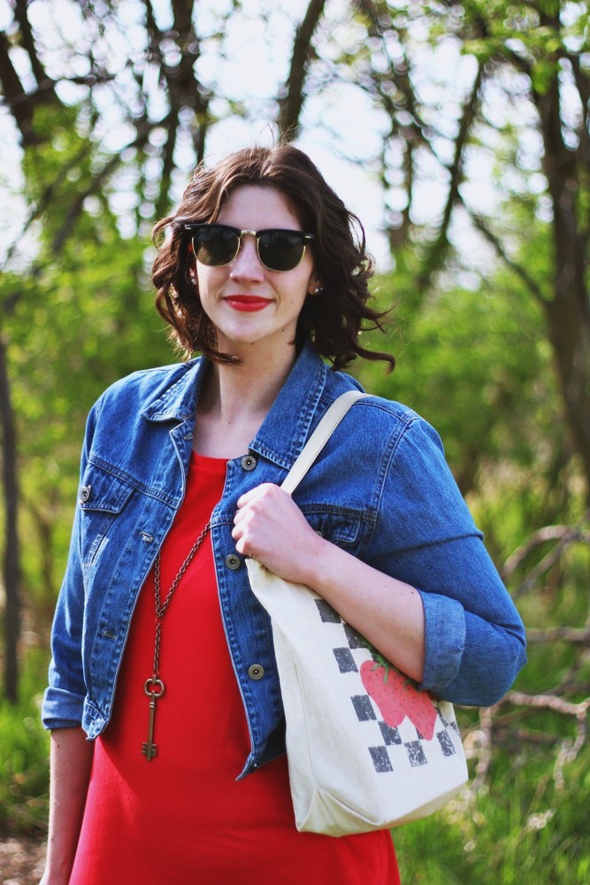 hannah rupp the outfit repeater Thrifted red dress, denim jacket, vintage strawberry tote bag.