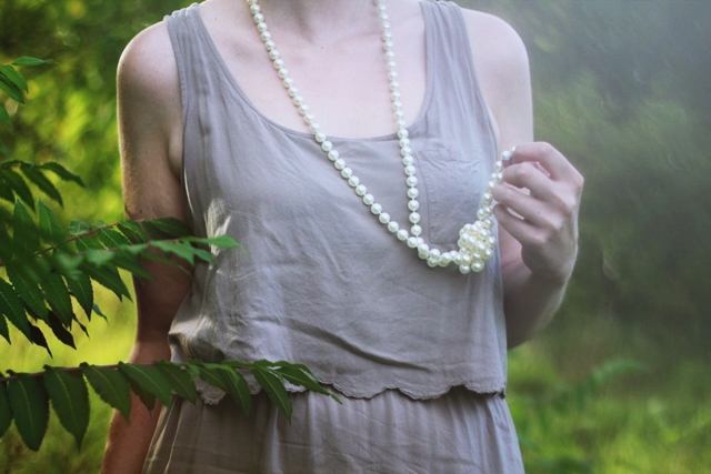 Outfit details: long faux vintage pearl necklace, beige dress