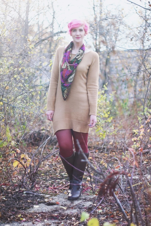 A Sweater Dress Kind of Day | The Outfit Repeater Outfit: camel colored thrifted sweater dress, burgundy maroon tights, dark brown knee high boots, purple multi-colored scarf, curly bright pink pixie cut short hair