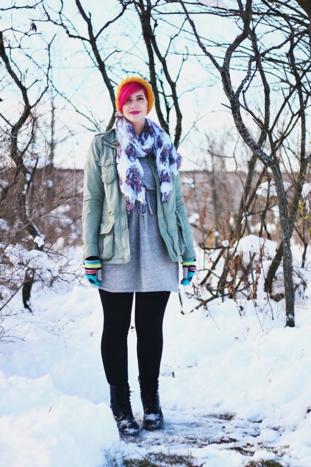 Outfit: outerwear for winter, gray sweatshirt dress, black leggings, olive green utility jacket, black Doc Martens, yellow hat, bright pink hair
