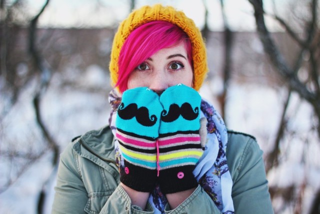 Outfit: outerwear for winter, gray sweatshirt dress, black leggings, olive green utility jacket, black Doc Martens, yellow hat, bright pink hair
