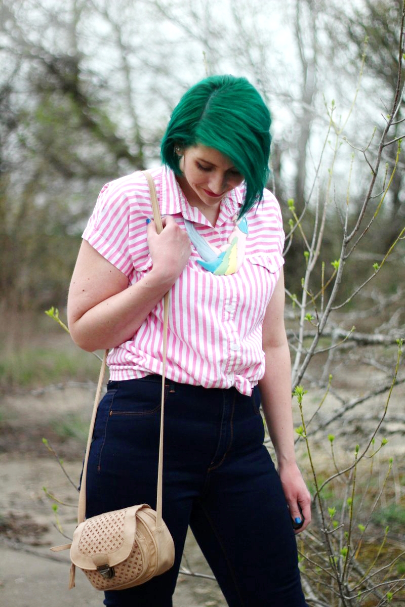 Outfit: pink striped button up, dark wash high waisted jeans, beige ASOS purse, a statement necklace in the shape of a parrot