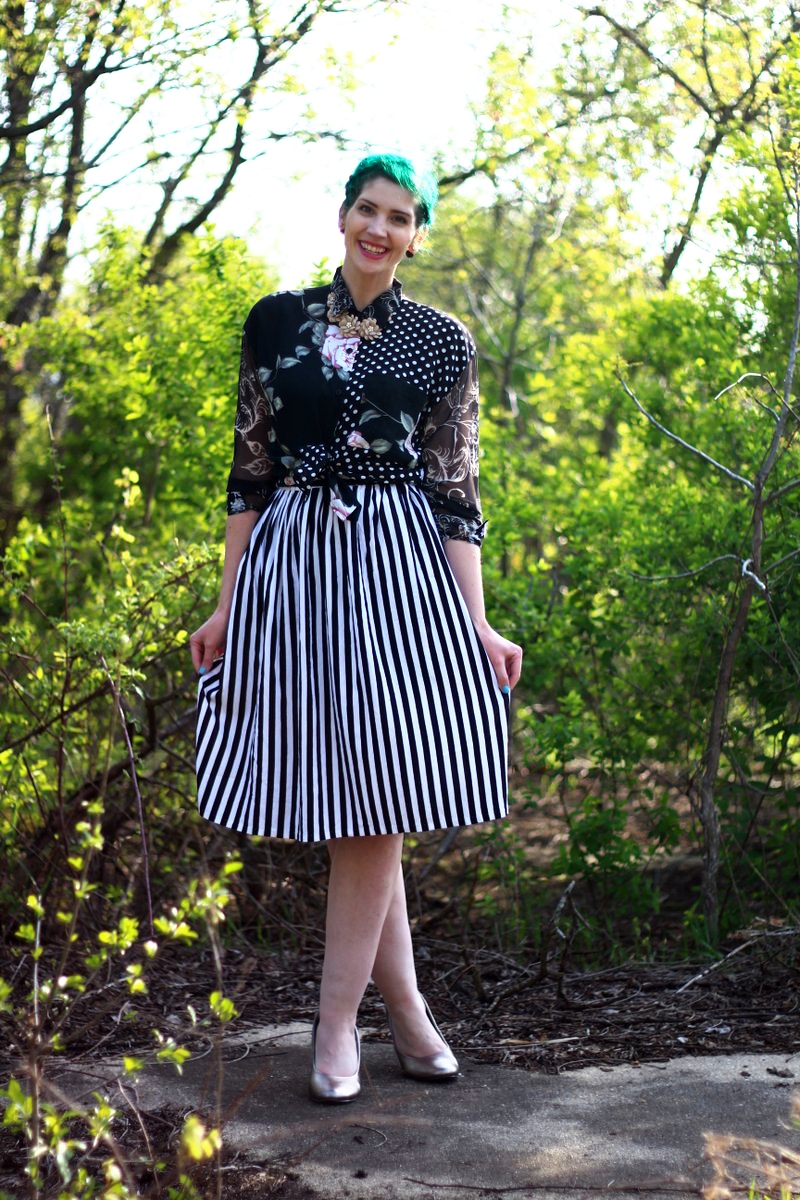 Mother's Day Outfit: Contempo Casual printed shirt, striped skirt, silver high heels, beige floral necklace, green hair