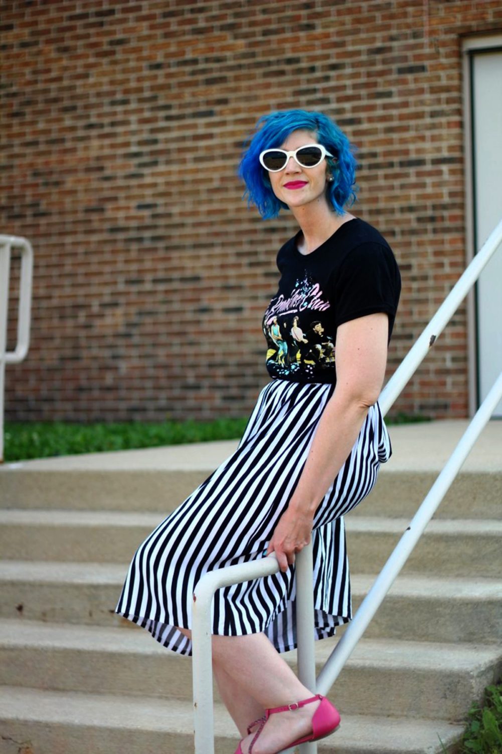 Outfit: Breakfast club graphic tee, black and white striped skirt, blue hair, pink lipstick, pink flats, white Giant Vintage sunglasses