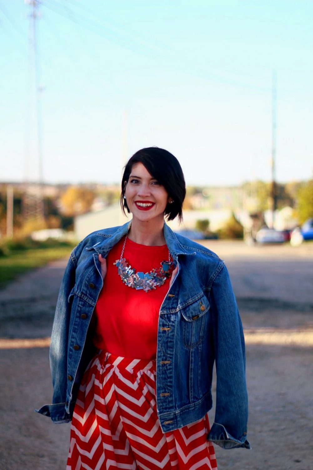 The Classy Junk Stole My Look! | www.theoutfitrepeater.com Outfit: Vintage red top, DIY puzzle piece necklace, red lipstick, thrifted orange chevron skirt, vintage denim jacket