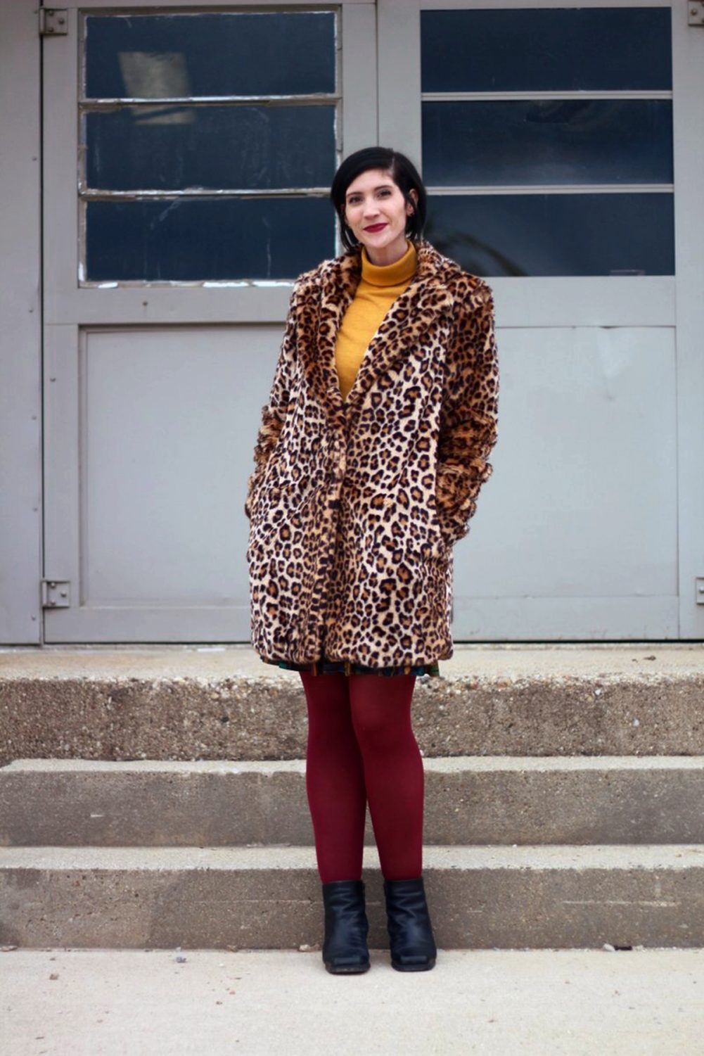 How A Leopard Print Coat Can Change Your Life | www.theoutfitrepeater.com Outfit: Leopard print coat, mustard yellow turtleneck, multi colored skirt, maroon tights, black booties