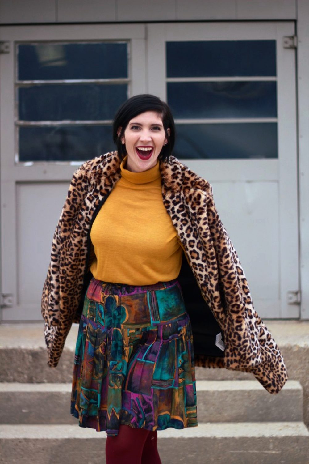 How A Leopard Print Coat Can Change Your Life | www.theoutfitrepeater.com Outfit: Leopard print coat, mustard yellow turtleneck, multi colored skirt