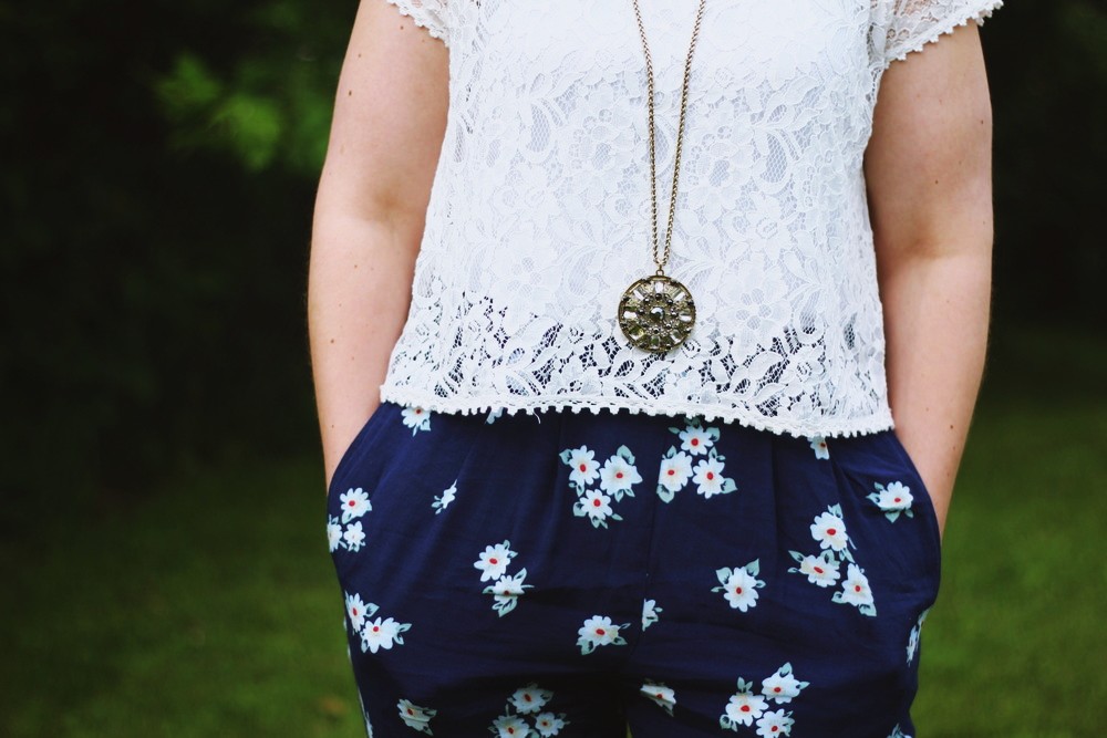 hannah rupp the outfit repeater floral high waisted pants white lace crop top summer fashion